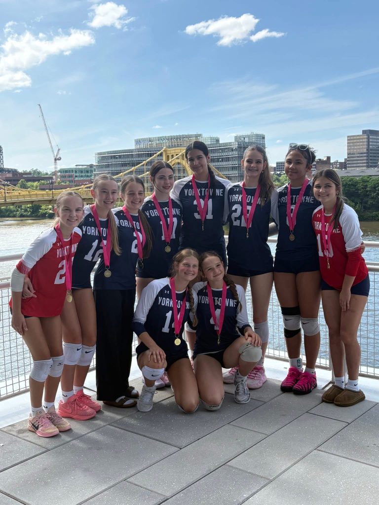Yorktowne volleyball athletes gathered outdoors