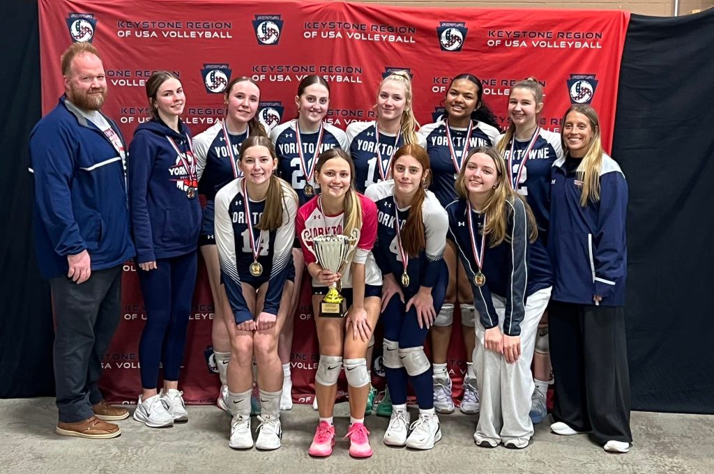 Yorktowne girls volleyball team with coaches after a tournament